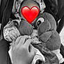baby, black_and_white, blanket, child, clothing, cozy, cute, fabric, hand, holding_hand, infant, person, protective, soft, stroller, stuffed_animal, tender_moment, toy, warm, wrapped