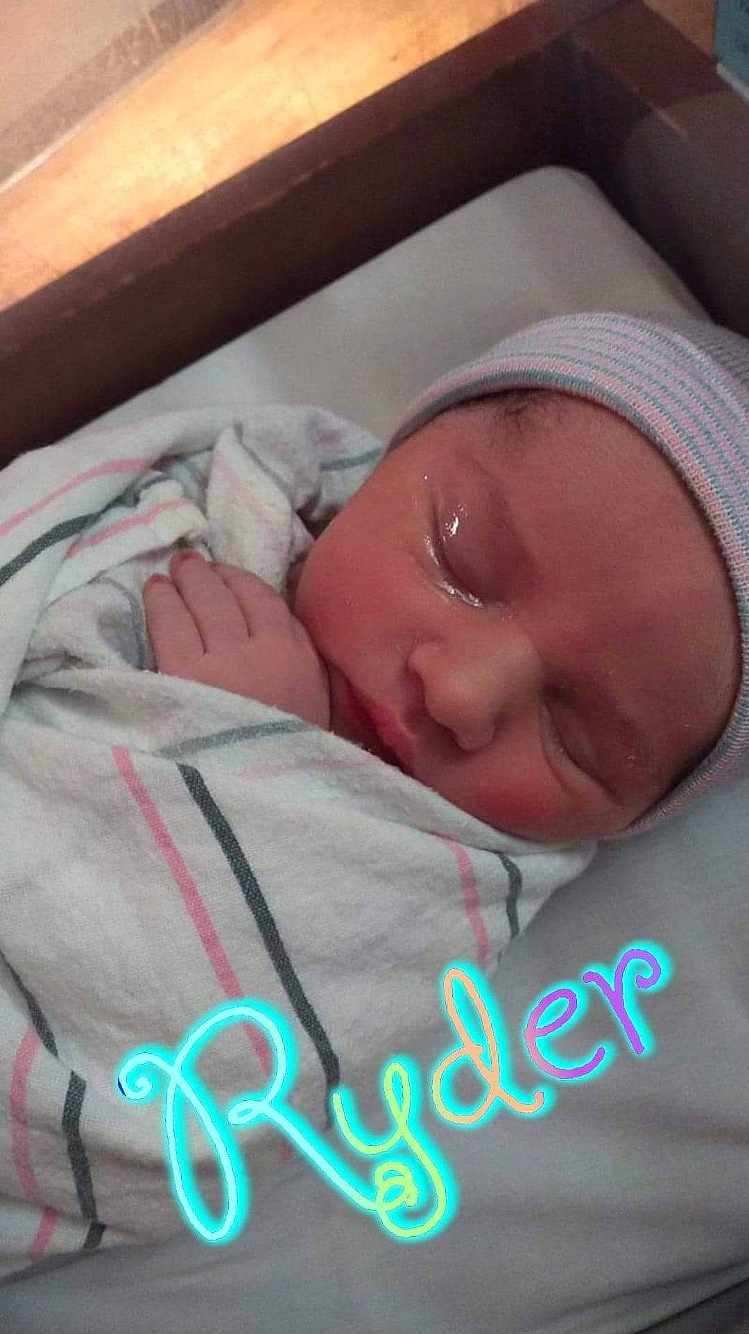 Ryder is registered to the contest to win money with this photo: baby, baby_products, baby_sleeping, baby_toddler_clothing, bedtime, cheek, child, comfort, eyebrow, eyelash, happy, headwear, linens, mammal, mouth, nap, person, product, room, skin