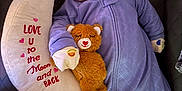 Ryder is registered to the contest to win money with this photo: baby, infant, sleeping_baby, closed_eyes, teddy_bear, plush_toy, moon_pillow, embroidered_text, onesie, lavender_clothing, blanket, crib, bedding, soft_texture, cute, peaceful, hand_mitten, nursery, indoor, portrait