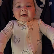 Ryder joined the competition — help win amazing prizes! baby, infant, smiling, onesie, dog_prints, cloud_background, baby_bouncer, chubby_cheeks, closeup, portrait, happy, hands, zipper, fabric, soft_lighting, rosy_cheeks, lying_down, nursery, cute, animal_pattern