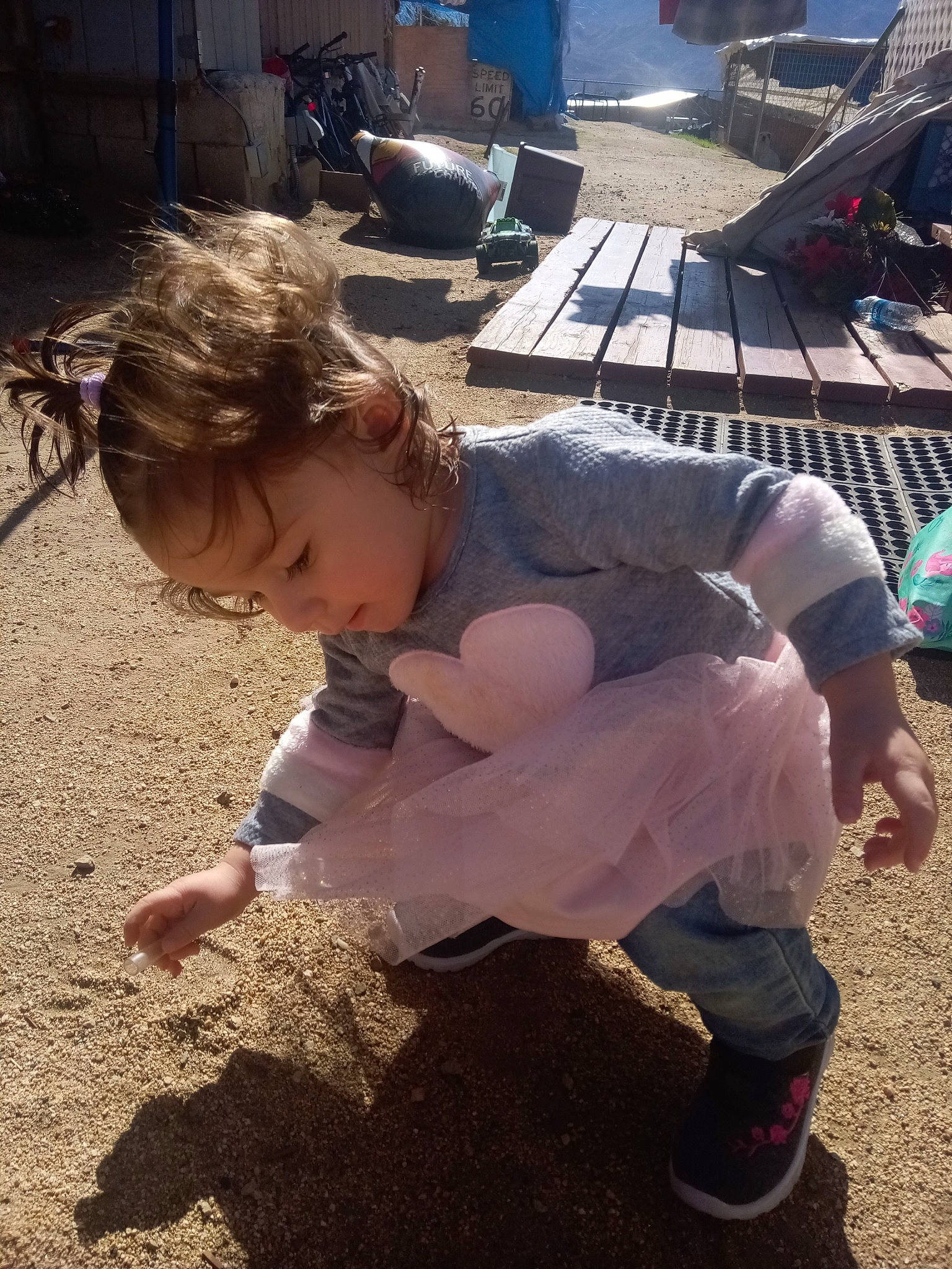 Jazmyn joined the competition — help win amazing prizes! barefoot, bicycle_wheel, child, event, flooring, foot, fun, grass, human_leg, landscape, leisure, person, play, sand, sandal, shoe, sitting, sneakers, soil, thigh