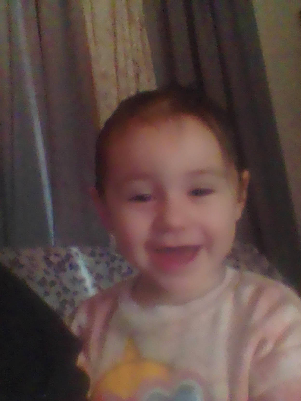 Jazmyn is registered to the contest to win money with this photo: baby, baby_toddler_clothing, cheek, child, curtain, eyebrow, face, forehead, fun, happy, iris, joy, lip, mouth, nose, person, sitting, skin, smile, t_shirt