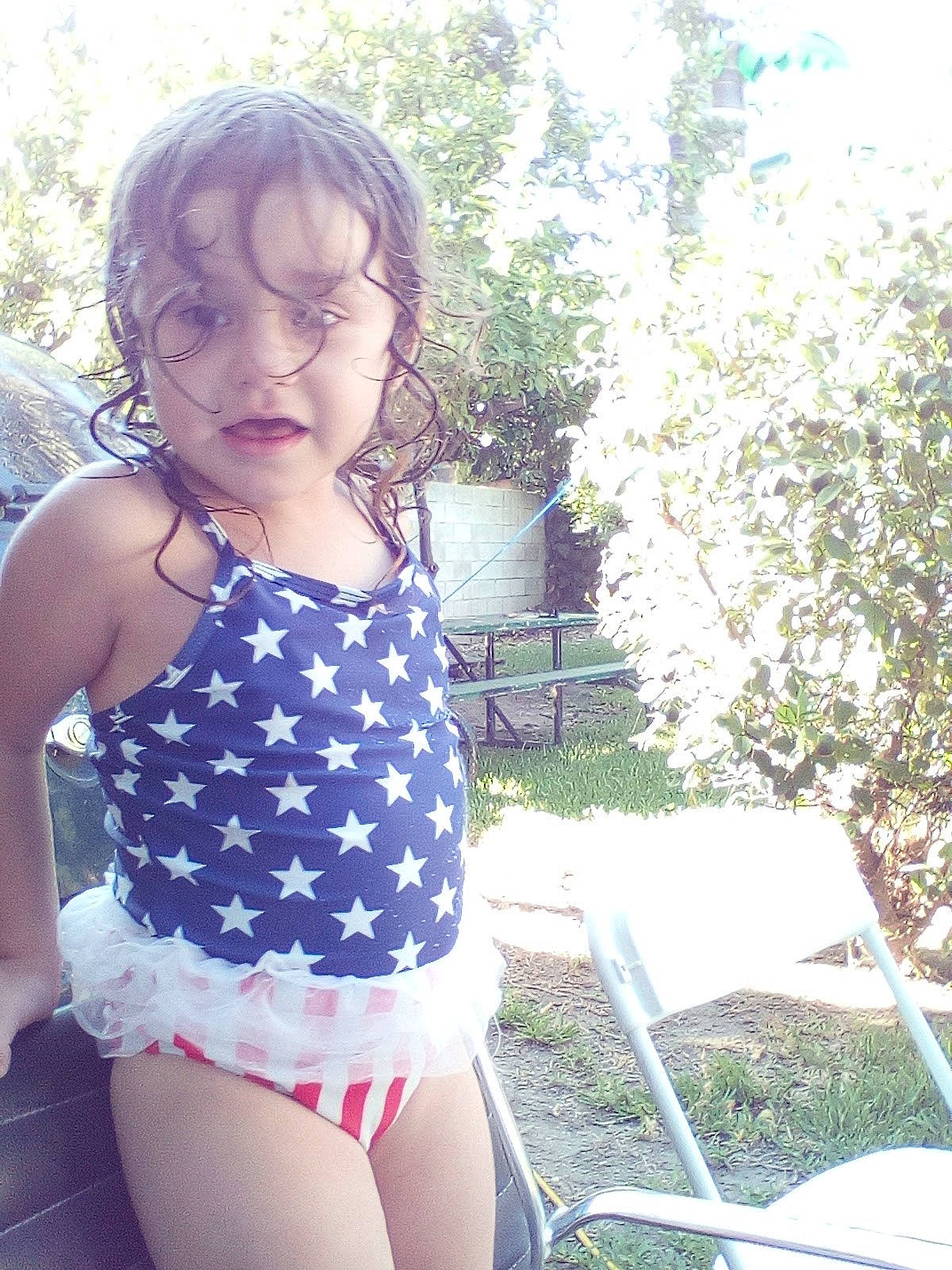 Jazmyn is registered to the contest to win money with this photo: abdomen, chair, chest, electric_blue, eyewear, fun, grass, happy, human_leg, leaf, leisure, lingerie, lingerie_top, person, plant, swimwear, thigh, toddler, trunk, undergarment