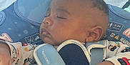 Loyal a rejoint le concours — aidez-le/la à gagner de superbes lots ! baby, sleeping, car_seat, child, infant, blue, straps, whale, pattern, clothing, hand, face, closed_eyes, comfort, seat, safety, cute, peaceful, toddler, resting