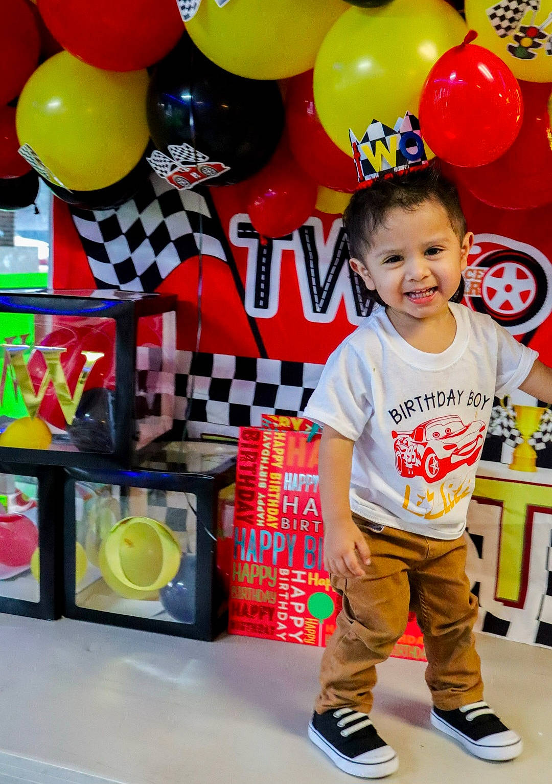 Ezra joined the competition — help win amazing prizes! arch, audio_equipment, baby_toddler_clothing, balloon, child, event, fun, happy, joy, leisure, party, party_supply, person, photograph, product, room, smile, snapshot, t_shirt, toddler