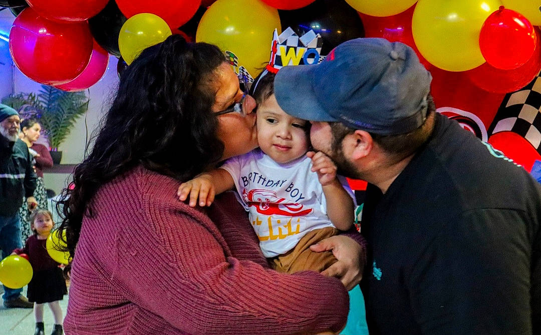 Ezra is registered to the contest to win money with this photo: baby, balloon, baseball_cap, birthday, child, community, event, fun, happy, headwear, holiday, leisure, magenta, party, party_supply, person, photograph, pink, recreation, red
