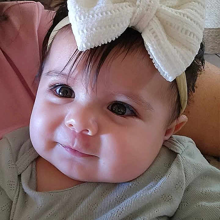 Jasmine Miamor is registered to the contest to win money with this photo: accessories, baby, cap, clothing, coat, couch, cushion, earring, face, furniture, happy, hat, head, homedecor, jewelry, person, photography, portrait, scarf, smile