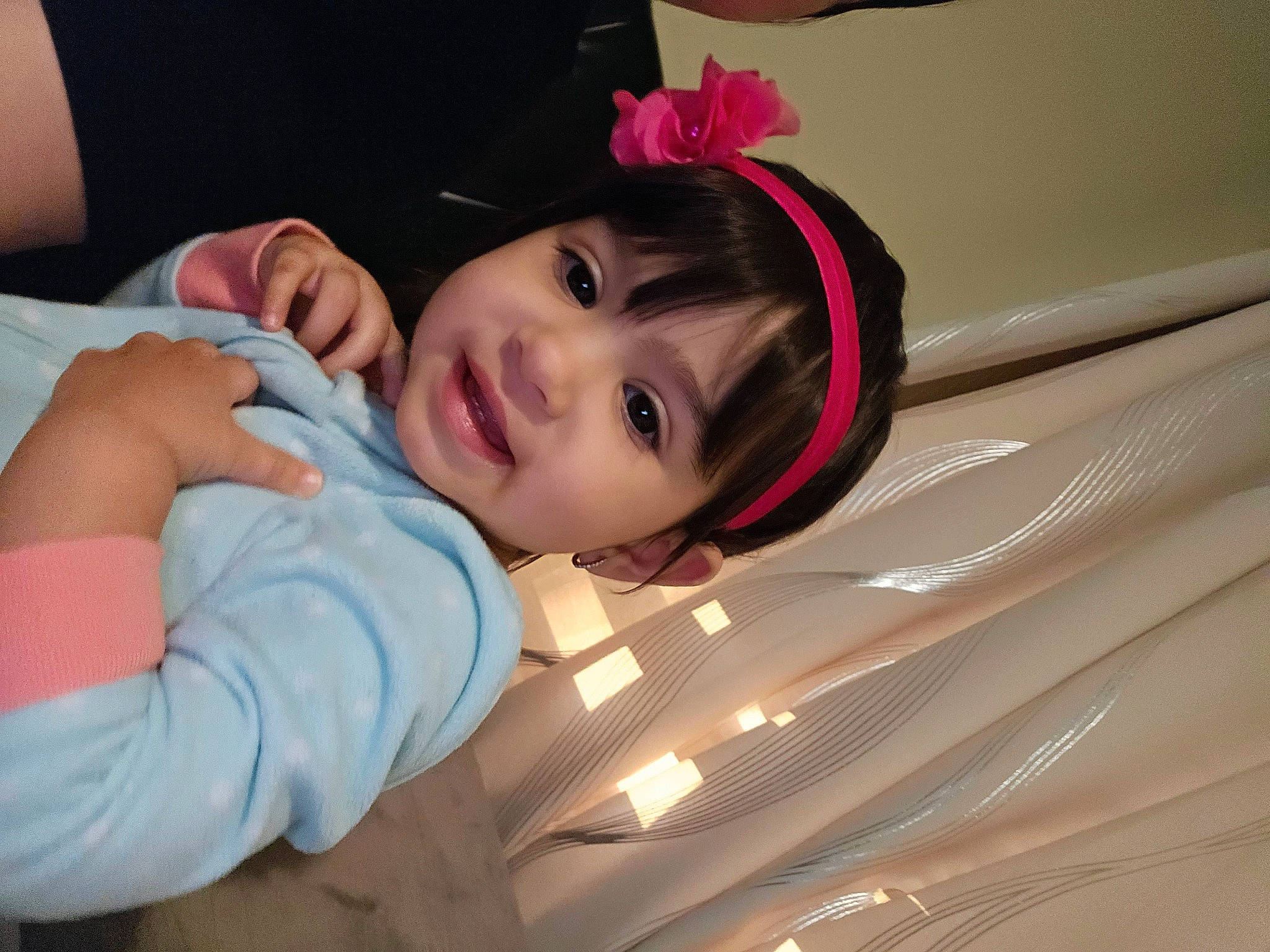 Kyra is registered to the contest to win money with this photo: automotive_lighting, black_hair, cheek, child, eyebrow, eyelash, fashion_accessory, flash_photography, fun, happy, human_body, iris, lip, long_hair, mouth, nose, person, pink, skin, smile