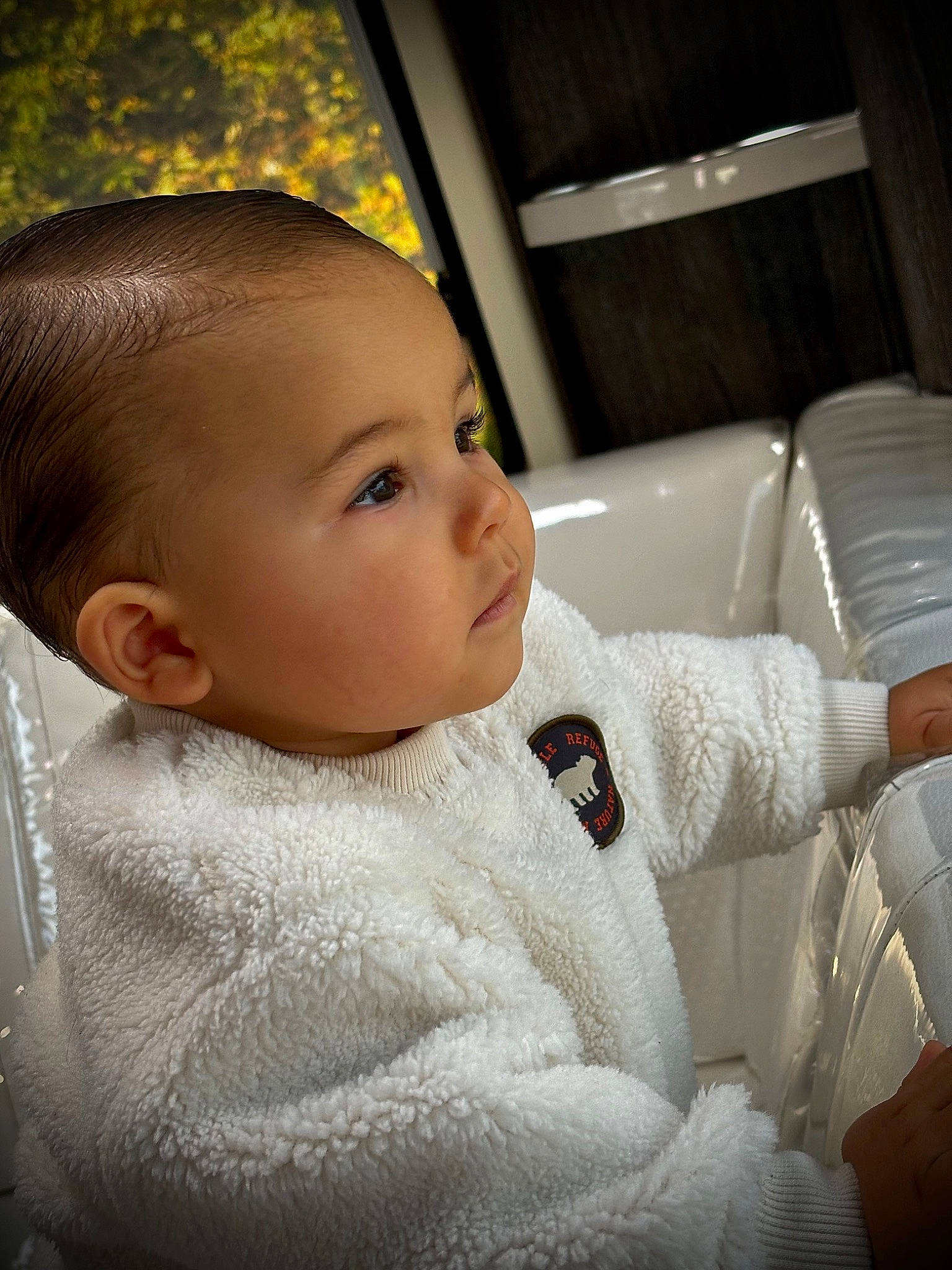 Swan participe au concours pour gagner de l'argent avec cette photo : baby, baby_toddler_clothing, car_seat, cheek, child, chin, comfort, eyebrow, eyelash, fur, happy, iris, linens, lip, nose, person, sitting, skin, sleeve, tints_and_shades