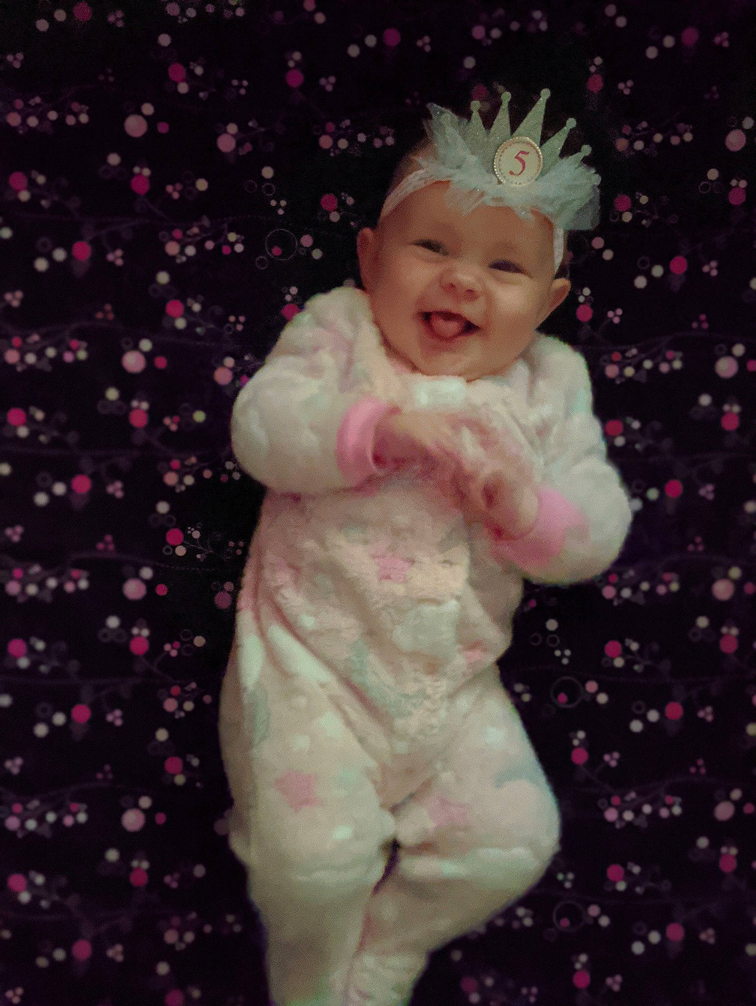 Astrid joined the competition — help win amazing prizes! baby, baby_laughing, baby_toddler_clothing, cheek, child, face, fun, gesture, happy, head, headwear, magenta, pattern, person, petal, pink, plant, skin, sleeve, smile