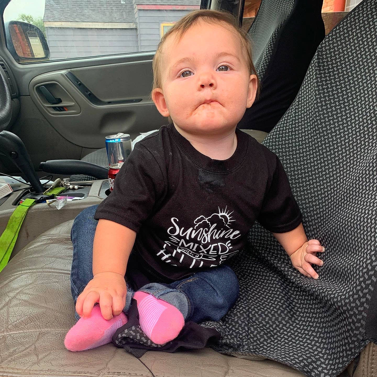 Calliope Rhayne joined the competition — help win amazing prizes! baby, baby_toddler_clothing, car_seat, car_seat_cover, cheek, child, comfort, finger, flooring, head, knee, lap, leg, person, sitting, skin, sleeve, steering_wheel, t_shirt, toddler