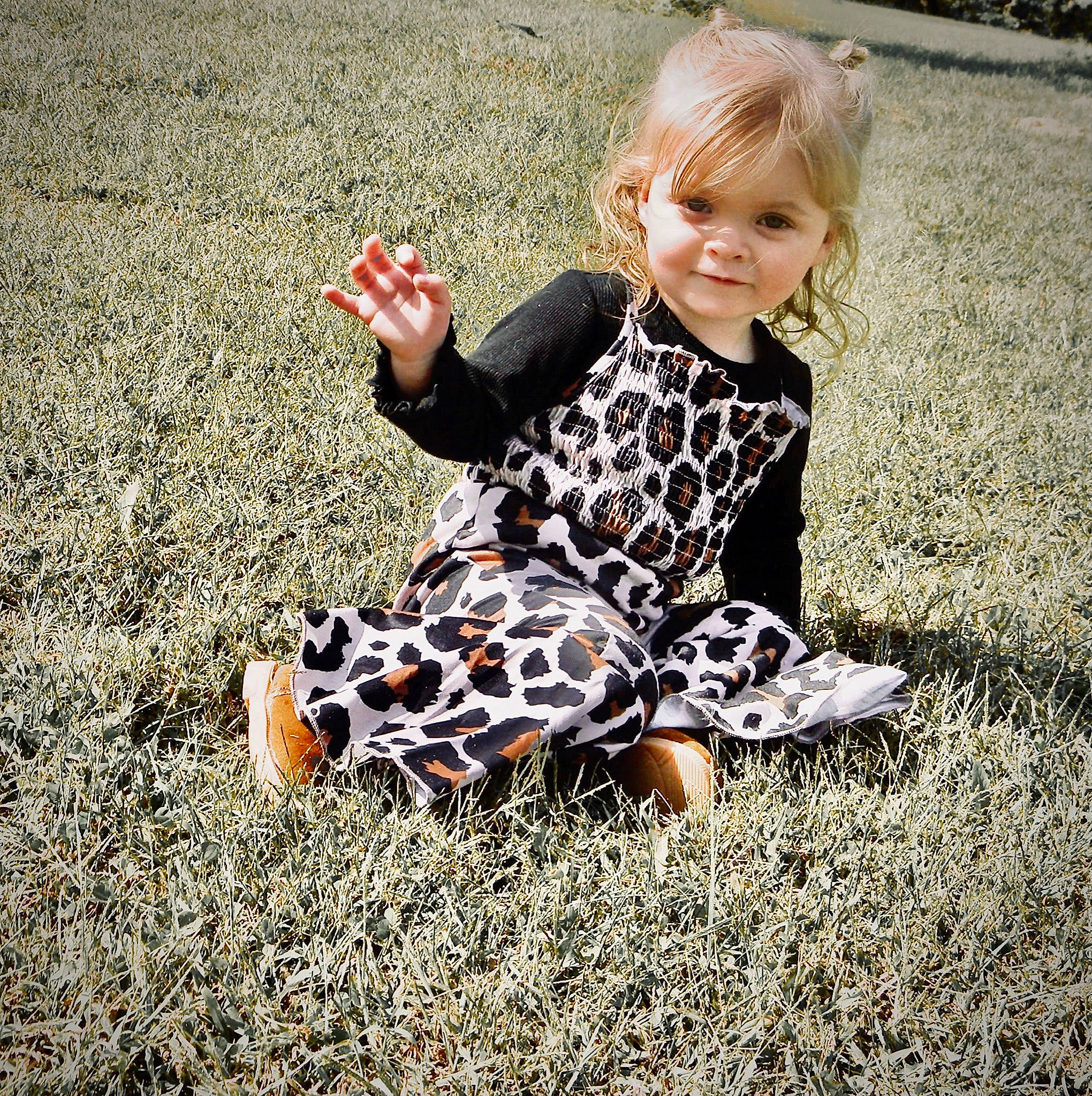 Harper joined the competition — help win amazing prizes! baby_toddler_clothing, blond, child, flooring, fun, grass, happy, human_leg, joy, pattern, people, people_in_nature, person, portrait_photography, shadow, sitting, sleeve, smile, soil, t_shirt