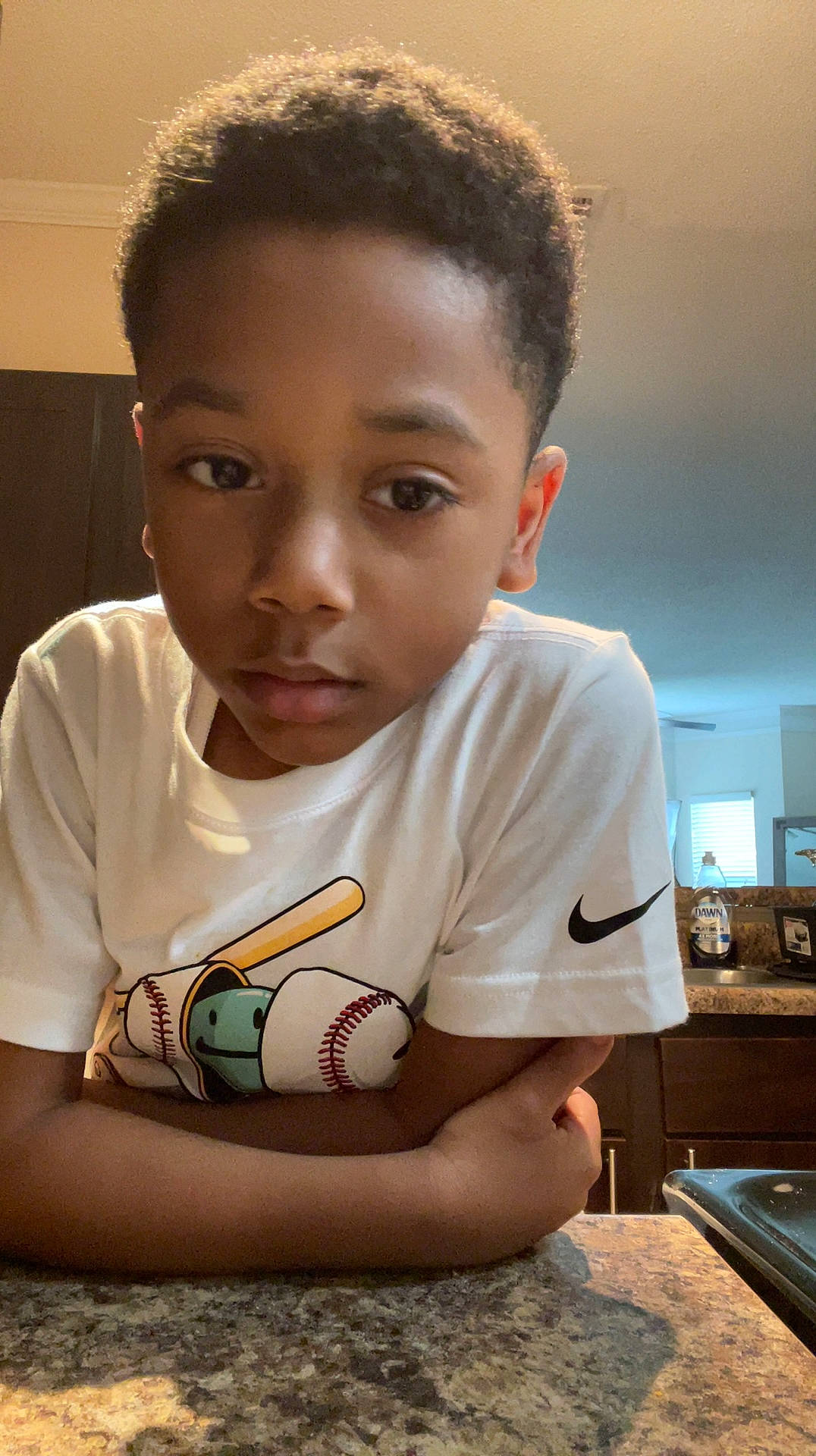 Santana joined the competition — help win amazing prizes! arm, beauty, caesar_cut, cheek, child, chin, eyebrow, flooring, forehead, fun, hair, happy, head, neck, nose, person, sitting, skin, sleeve, t_shirt