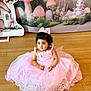 toddler, child, pink_dress, princess, bow, floor, wooden_floor, mushrooms, backdrop, bunny, fairy_tale, cute, portrait, indoor, decor, flowers, sitting, young_child, dress, adorable
