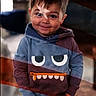 Zeeland is registered to the contest to win money with this photo: american_flag_overlay, background_blur, boy, casual_clothing, child, creative, cute, expression, fashion, hair, hands_in_pockets, hoodie, indoor, nike, person, portrait, smile, standing, sweatpants, young_child