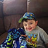 Zeeland joined the competition — help win amazing prizes! blanket, cap, casual, child, clothing, colorful, couch, cozy, face, fun, happy, hat, indoor, patterned_blanket, paw_patrol, portrait, sitting, smiling, toddler, young_child