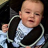 Roman joined the competition — help win amazing prizes! baby, child, stroller, seatbelt, birthday_shirt, smile, face, hand, clothing, infant, cute, rosy_cheeks, portrait, sitting, person, young_child, closeup, happy, baby_clothes, car_seat