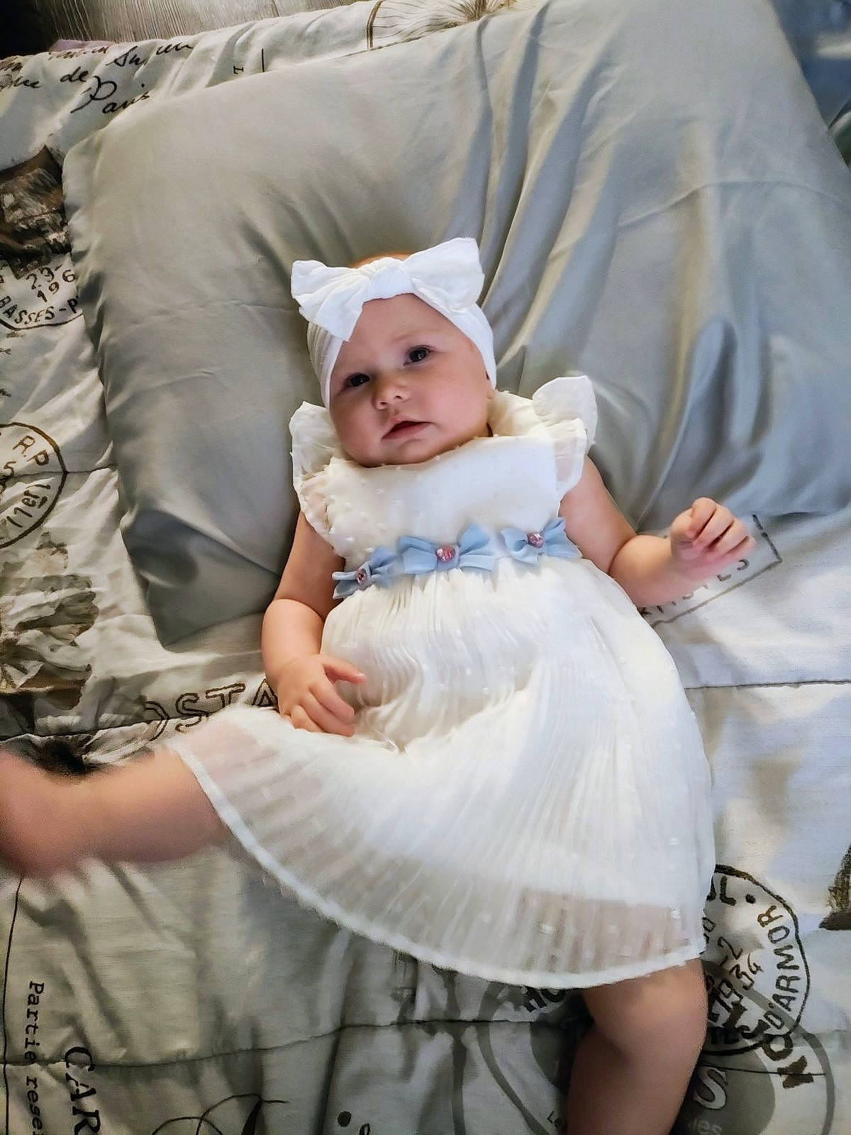 Vayda is registered to the contest to win money with this photo: baby, baby_toddler_clothing, child, comfort, dress, embellishment, event, eye, fashion_design, flash_photography, hairstyle, happy, hat, headwear, human, person, pink, product, purple, skin