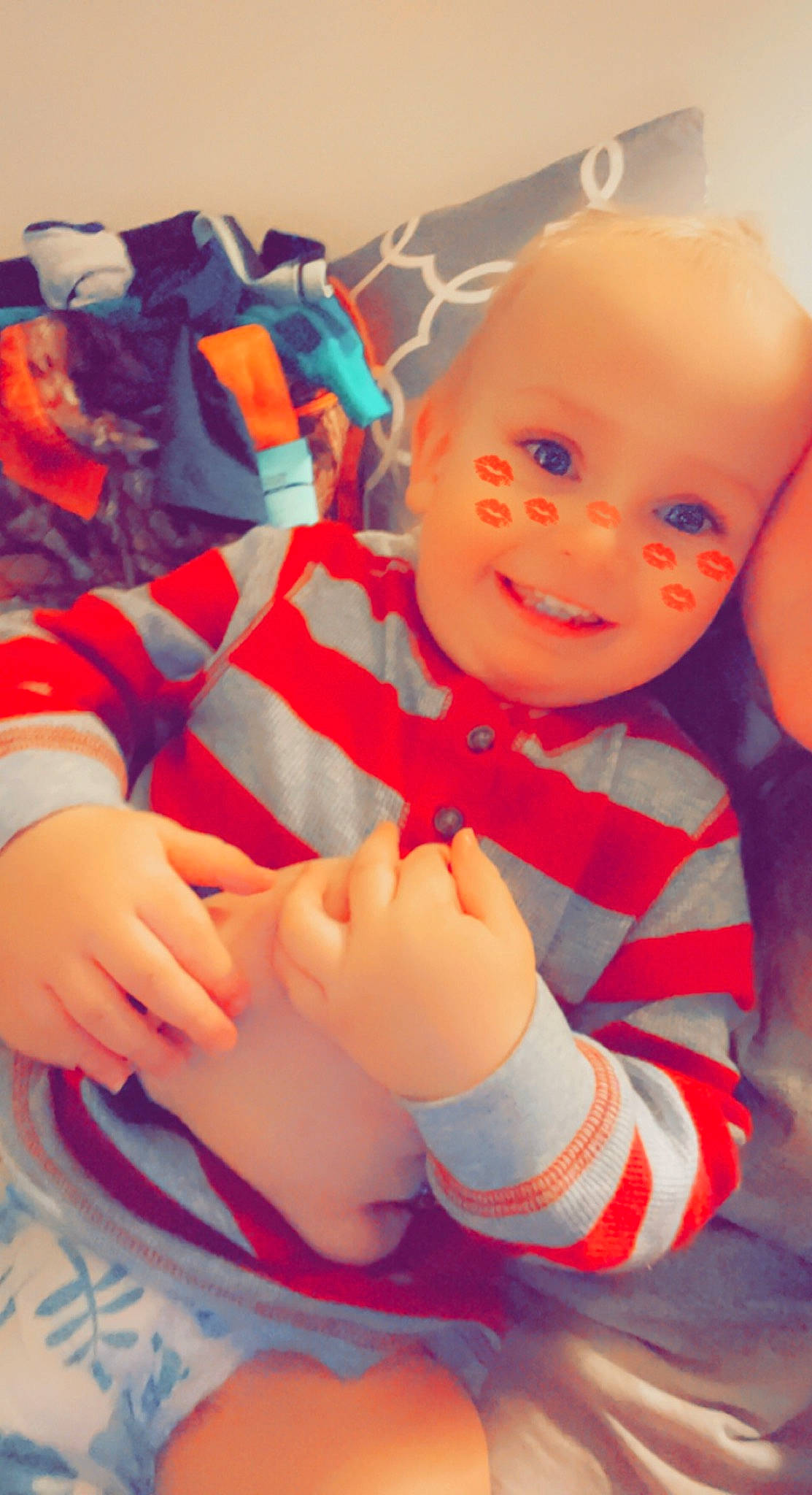 Paxton is registered to the contest to win money with this photo: azure, baby, baby_toddler_clothing, child, comfort, finger, gesture, happy, joy, knee, mouth, muscle, nail, nose, orange, person, pink, skin, smile, thigh