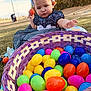 Ivonne is registered to the contest to win money with this photo: basket, bunny_ears, child, colorful, dress, easter_eggs, family, grass, headwear, holiday, nature, outdoor, park, person, play, reaching, spring, sunlight, toddler, toy