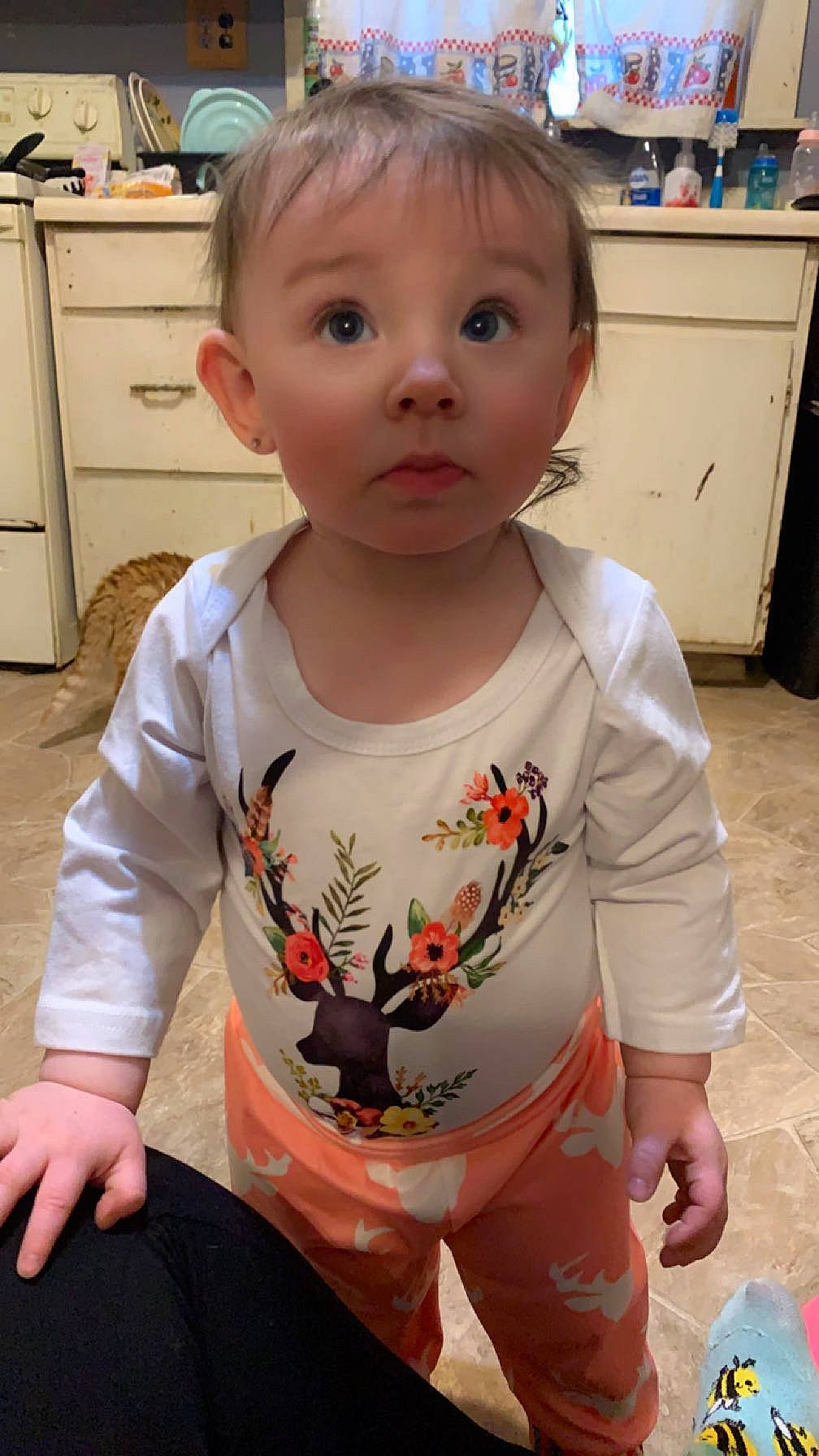 Kimber joined the competition — help win amazing prizes! baby, baby_toddler_clothing, cabinetry, cheek, child, chin, eyebrow, facial_expression, finger, flooring, forehead, hairstyle, mouth, neck, nose, person, skin, sleeve, standing, surprise