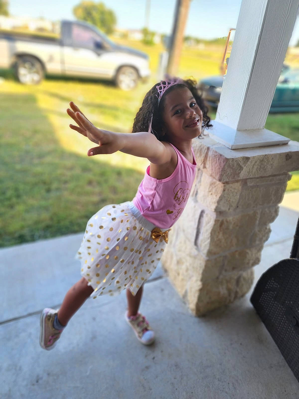 Alexandra is registered to the contest to win money with this photo: barefoot, car, event, foot, fun, grass, hairstyle, happy, human_leg, joy, leisure, person, plant, recreation, sandal, summer, thigh, tire, toddler, travel