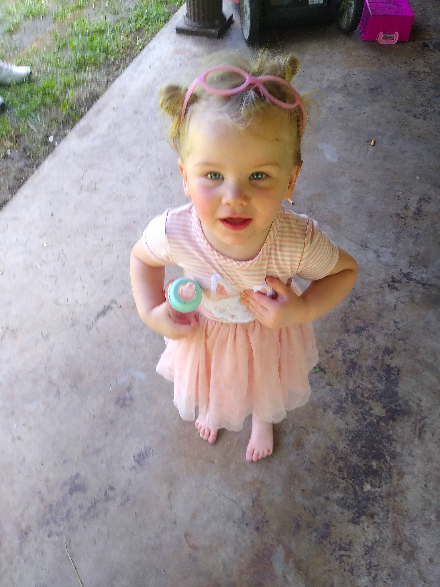 Marlie joined the competition — help win amazing prizes! asphalt, baby, baby_toddler_clothing, child, costume, foot, fun, grass, happy, magenta, person, pink, plant, recreation, road_surface, sidewalk, sitting, smile, tire, toddler