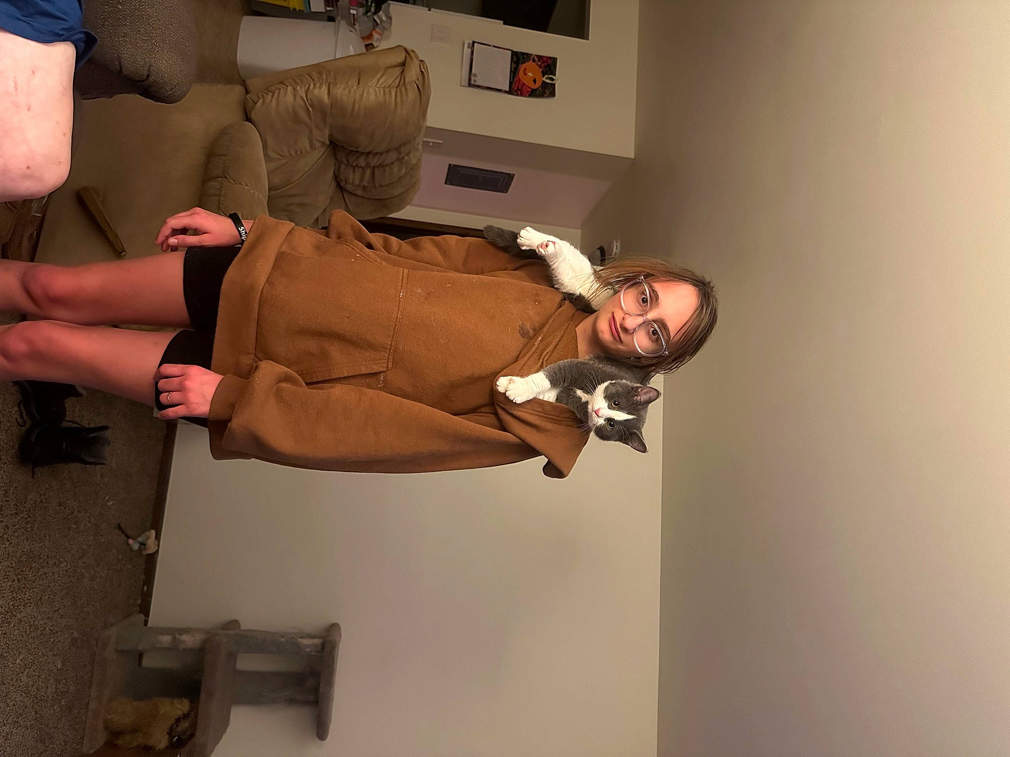 Ericka joined the competition — help win amazing prizes! boot, calf, comfort, couch, elbow, eyewear, fashion_design, foot, fun, human_leg, joy, knee, person, room, sandal, sitting, smile, sock, thigh, wrist