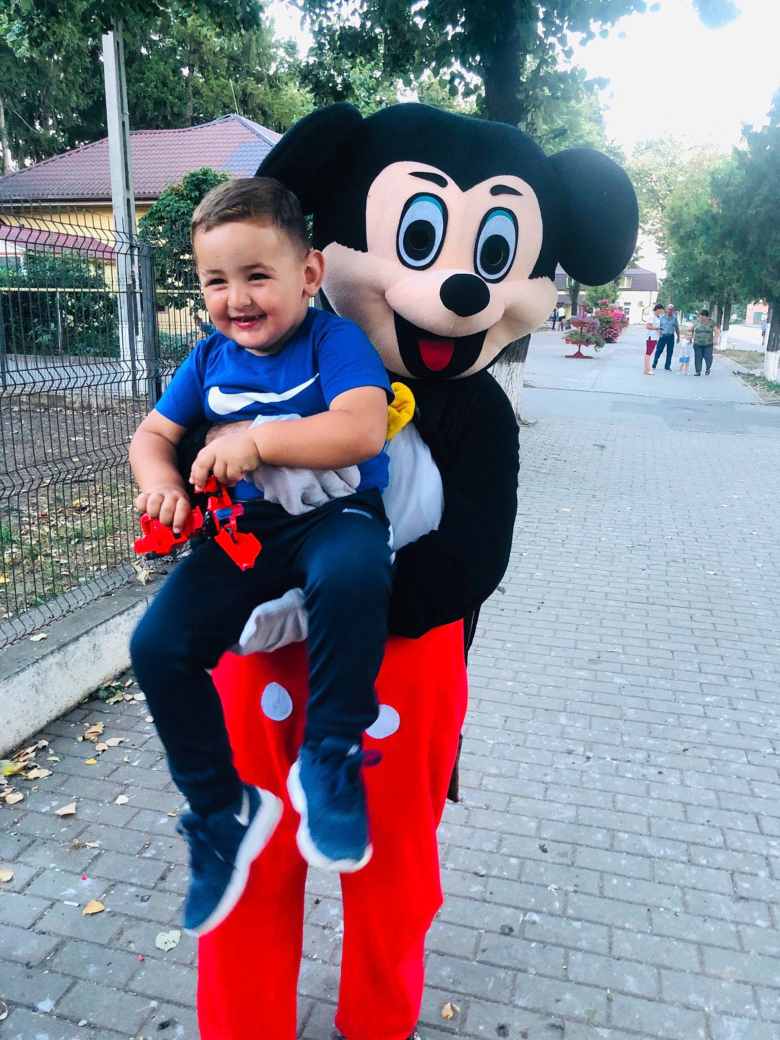 Denis joined the competition — help win amazing prizes! animated_cartoon, child, costume, fictional_character, fun, joy, leisure, mascot, nonbuilding_structure, park, person, plush, recreation, smile, textile, toddler, vacation, walt_disney_world, world