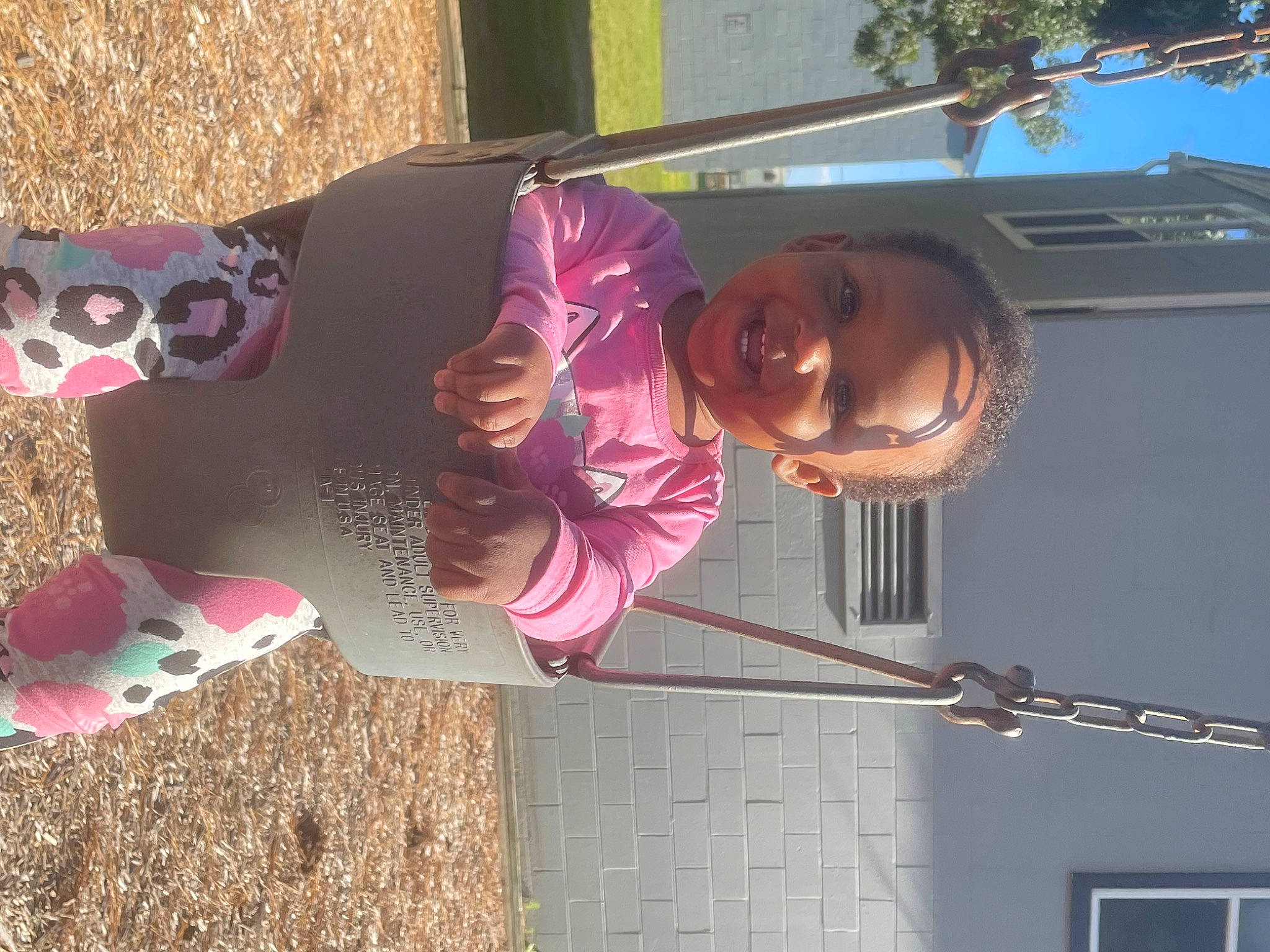 Reign is registered to the contest to win money with this photo: child, fun, happy, joy, leisure, magenta, mammal, pattern, person, photography, pink, plant, smile, toddler, tree, vertebrate, window