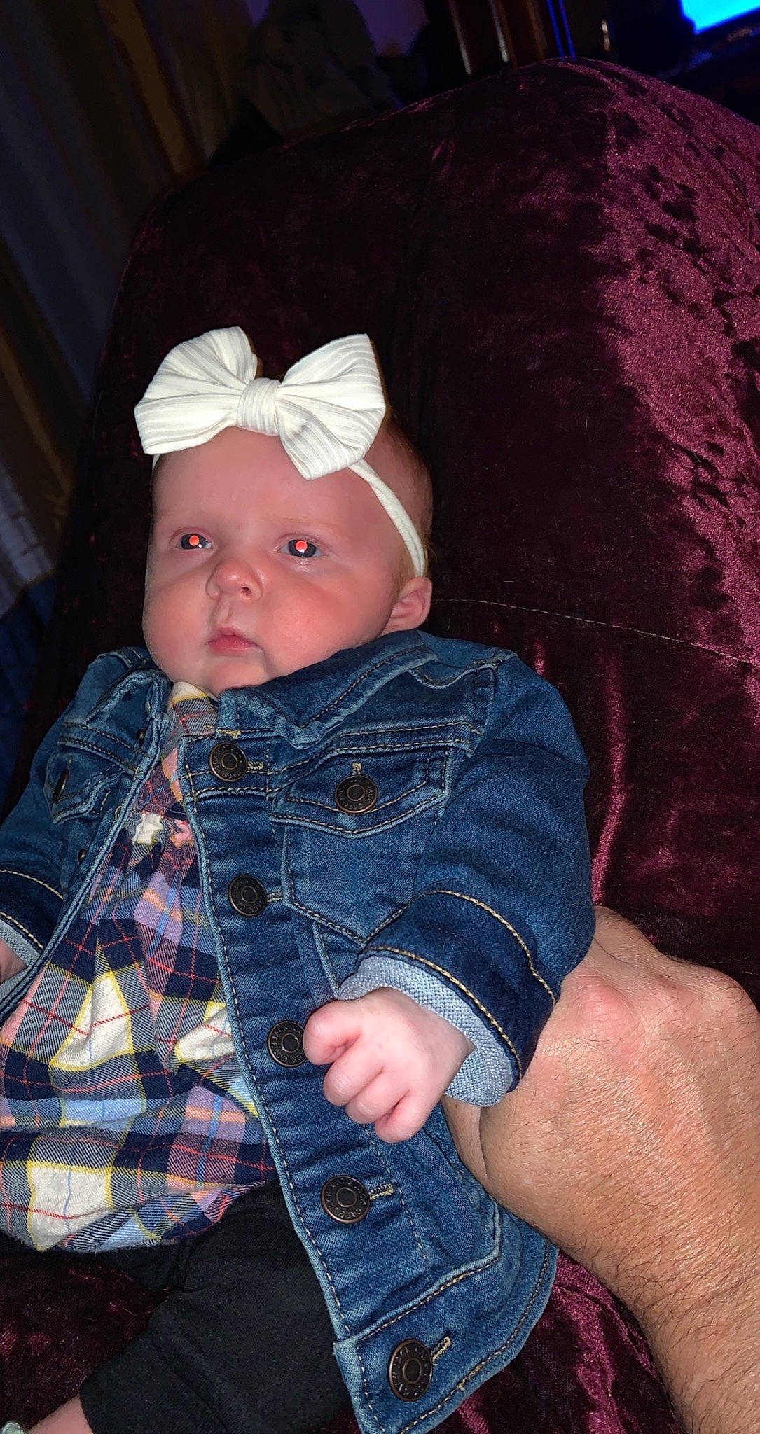 Everlee is registered to the contest to win money with this photo: baby, baby_toddler_clothing, cap, cheek, child, chin, clothing, denim, eye, foot, headwear, human_leg, iris, lip, pattern, person, plaid, sitting, skin, sleeve
