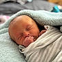 Waylon is registered to the contest to win money with this photo: baby, blanket, child, closeup, comfort, cozy, cute, face, hand, indoors, infant, newborn, peaceful, portrait, rest, skin, sleeping, soft, swaddle, wrapped