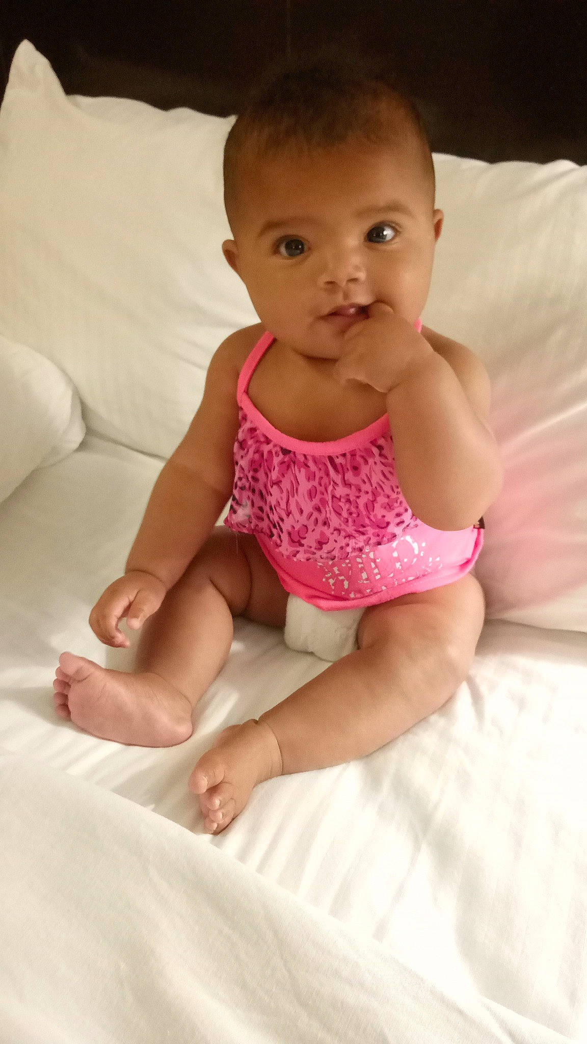 Asia is registered to the contest to win money with this photo: baby_toddler_clothing, cheek, chin, comfort, dress, eye, face, head, human_body, joint, knee, leg, lip, mouth, muscle, neck, person, shoulder, skin, stomach