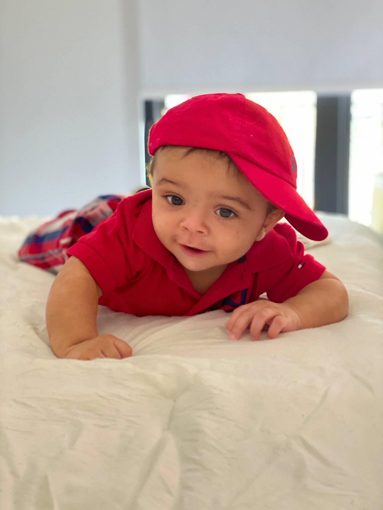 Allan joined the competition — help win amazing prizes! baby, cap, child, comfort, face, head, headgear, headwear, linens, person, photography, product, red, skin, smile, toddler