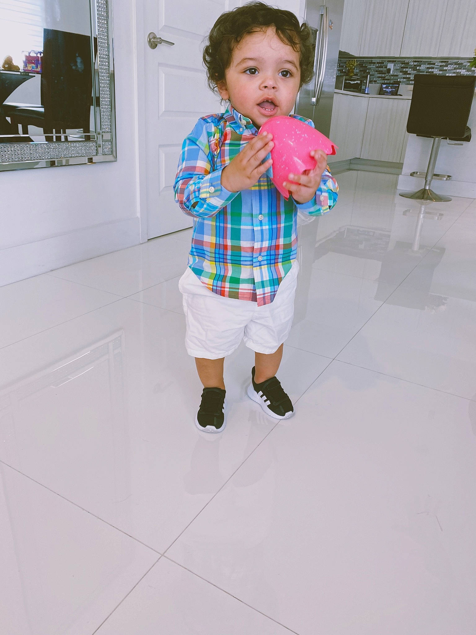 Allan is registered to the contest to win money with this photo: baby, child, floor, flooring, pattern, person, play, room, skin, standing, toddler