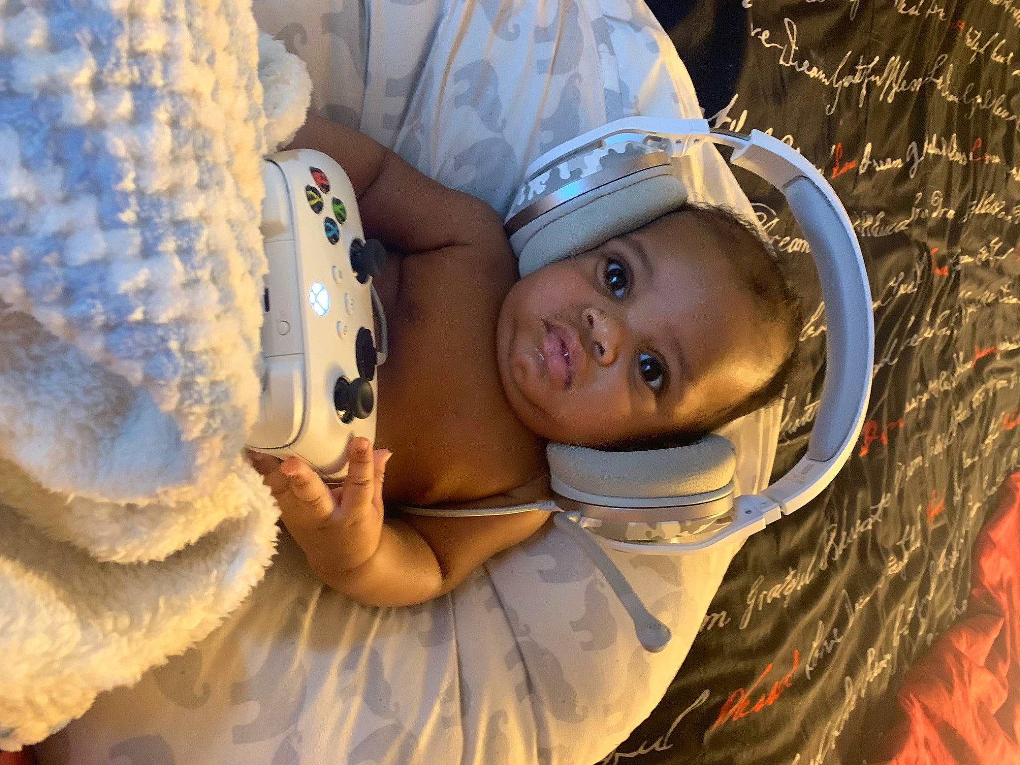 Kyrie is registered to the contest to win money with this photo: baby, baby_products, baby_toddler_clothing, cap, child, electric_blue, eye, facial_expression, fashion_accessory, flash_photography, fun, glove, hand, happy, hat, headgear, person, sun_hat, toddler, tradition