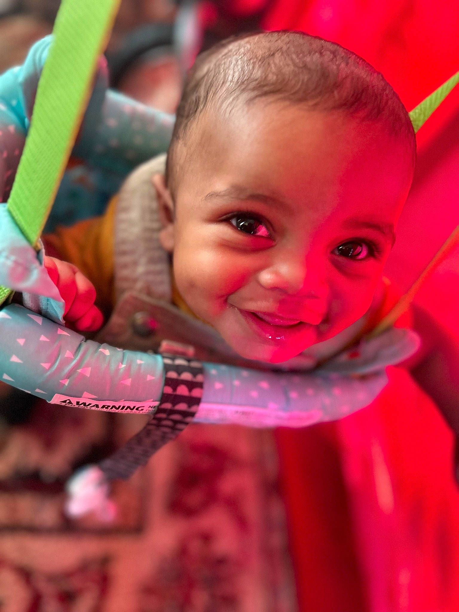 Kyrie is registered to the contest to win money with this photo: baby, cheek, child, chin, close_up, event, eye, fun, happy, human_body, iris, joy, leisure, lip, magenta, nose, person, pink, product, skin