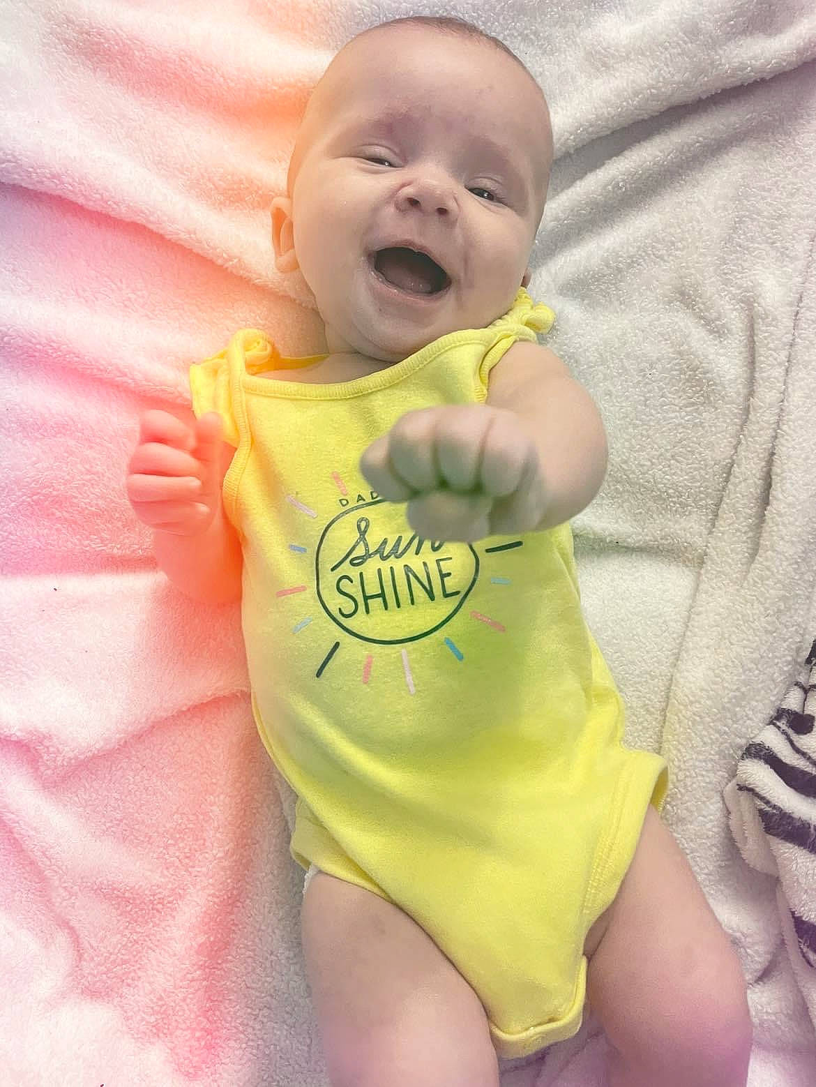 Makenna joined the competition — help win amazing prizes! baby, baby_toddler_clothing, cheek, child, face, finger, gesture, happy, head, human_body, iris, mouth, person, pink, skin, sleeve, smile, t_shirt, thigh, thumb