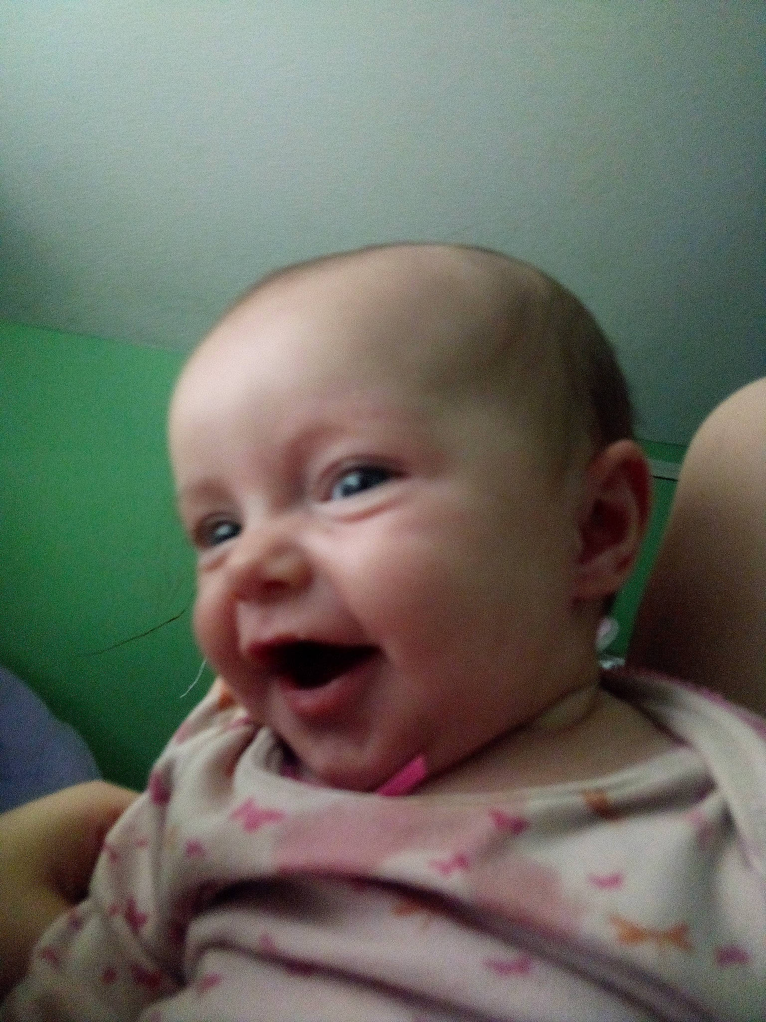 Mercy is registered to the contest to win money with this photo: baby, baby_toddler_clothing, cheek, child, comfort, ear, forehead, fun, gesture, happy, iris, jaw, lip, mouth, neck, nose, person, skin, smile, toddler