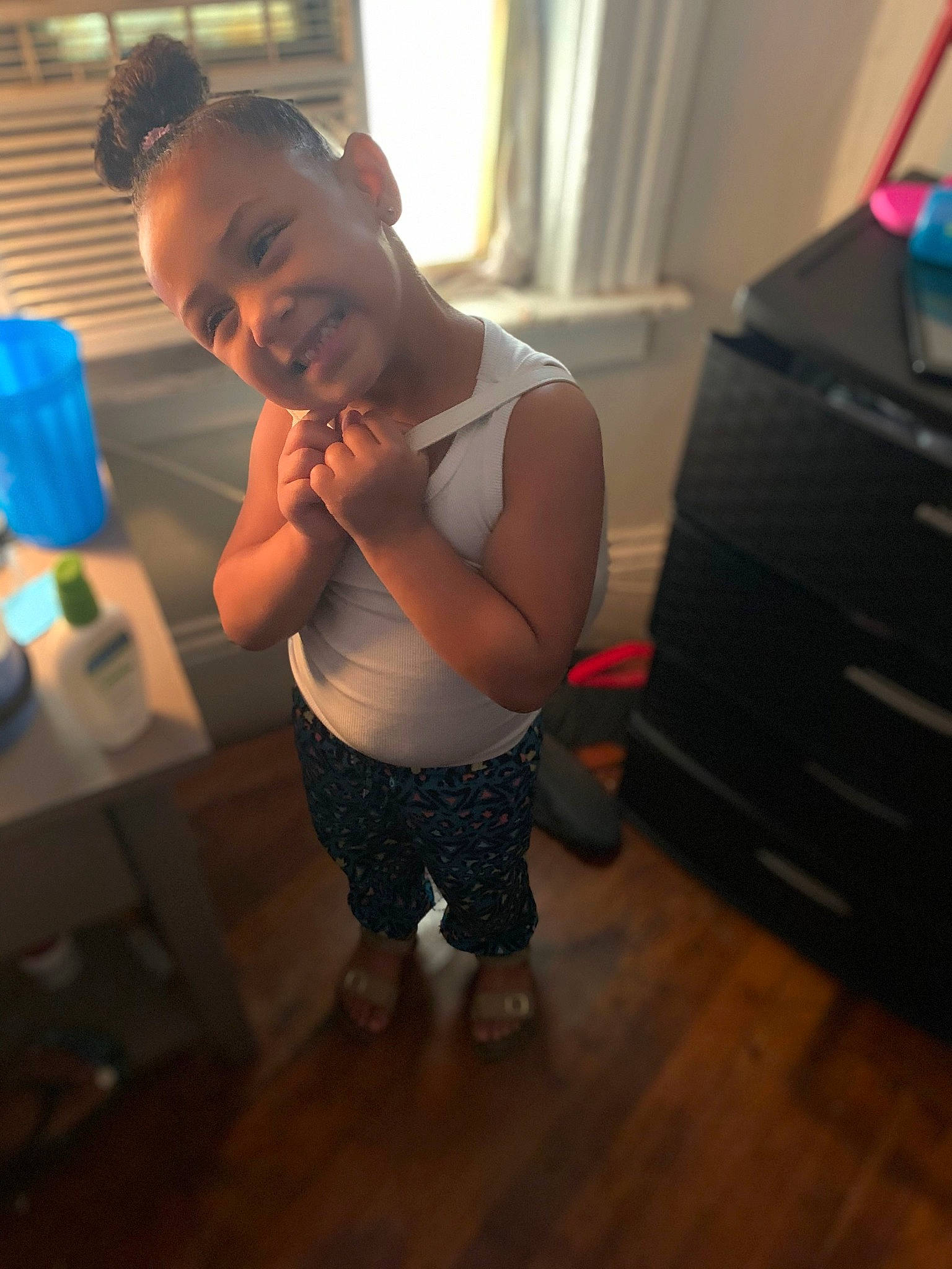 Marisa is registered to the contest to win money with this photo: arm, baby, child, cool, dress, footwear, fun, head, joint, joy, leg, muscle, person, selfie, shoe, shoulder, sportswear, standing, t_shirt, toddler