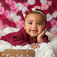 Nel joined the competition — help win amazing prizes! baby, smiling, headband, flower, blanket, basket, portrait, child, cute, happy, indoor, red, pink, white, cozy, warm, soft, face, person, newborn