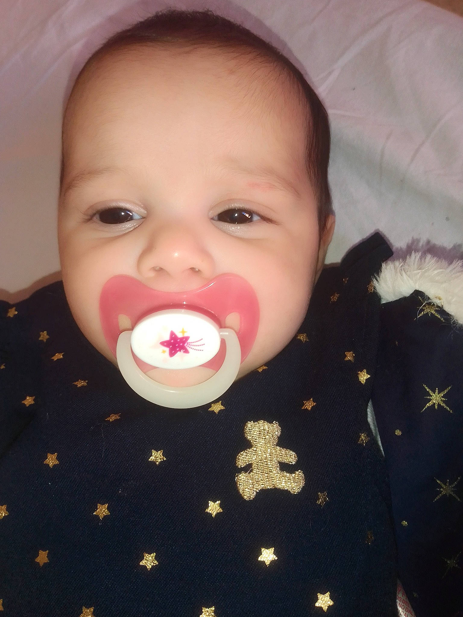 Emily Stiemer participe au concours pour gagner de l'argent avec cette photo : baby, baby_products, baby_toddler_clothing, button, cheek, child, eyebrow, eyelash, forehead, iris, lip, organ, person, skin, toddler, tongue