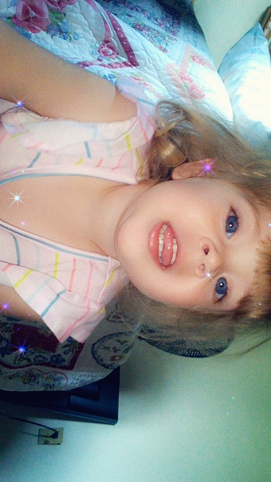 Harper Lynn is registered to the contest to win money with this photo: arm, barbie, brown_hair, cheek, chest, doll, dress, eyebrow, eyelash, hairstyle, human_body, iris, lip, long_hair, mouth, nose, person, pink, skin, toy