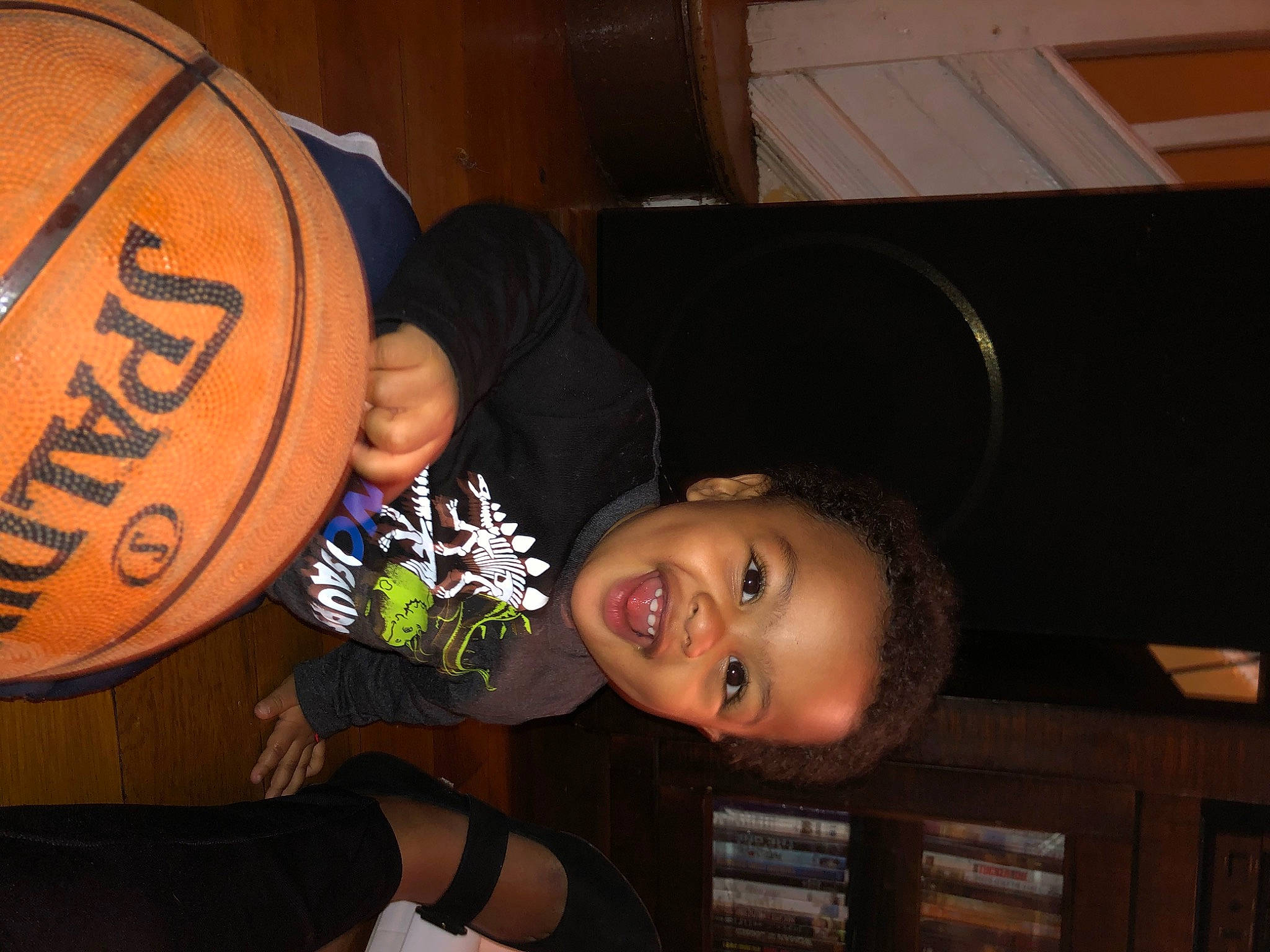 Mateo is registered to the contest to win money with this photo: child, event, fashion_accessory, fun, happy, hat, logo, person, room, smile, t_shirt, toddler