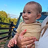 Wesley joined the competition — help win amazing prizes! baby, child, person, outdoor, blue_sky, vehicle, fence, hand, nail_polish, ring, grass, dirt, short_sleeve, smile, happy, holding, portrait, casual, daytime, nature