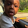 Treshawn joined the competition — help win amazing prizes! car, casual, child, clothing, curious, daylight, expression, face, hand, interior, outdoor, person, portrait, seat, shadow, skin, sunlight, toddler, window, young_child