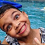 Louisa participe au concours pour gagner de l'argent avec cette photo : child, smiling, pool, water, wet, face, happy, summer, swimming, joyful, fun, outdoor, person, closeup, playful, girl, eyelashes, earring, skin, expression