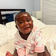 Snoh joined the competition — help win amazing prizes! baby, smiling, child, bed, robe, indoor, happy, cute, person, skin, foot, hand, head, pillow, blanket, furniture, home, cozy, portrait, infant