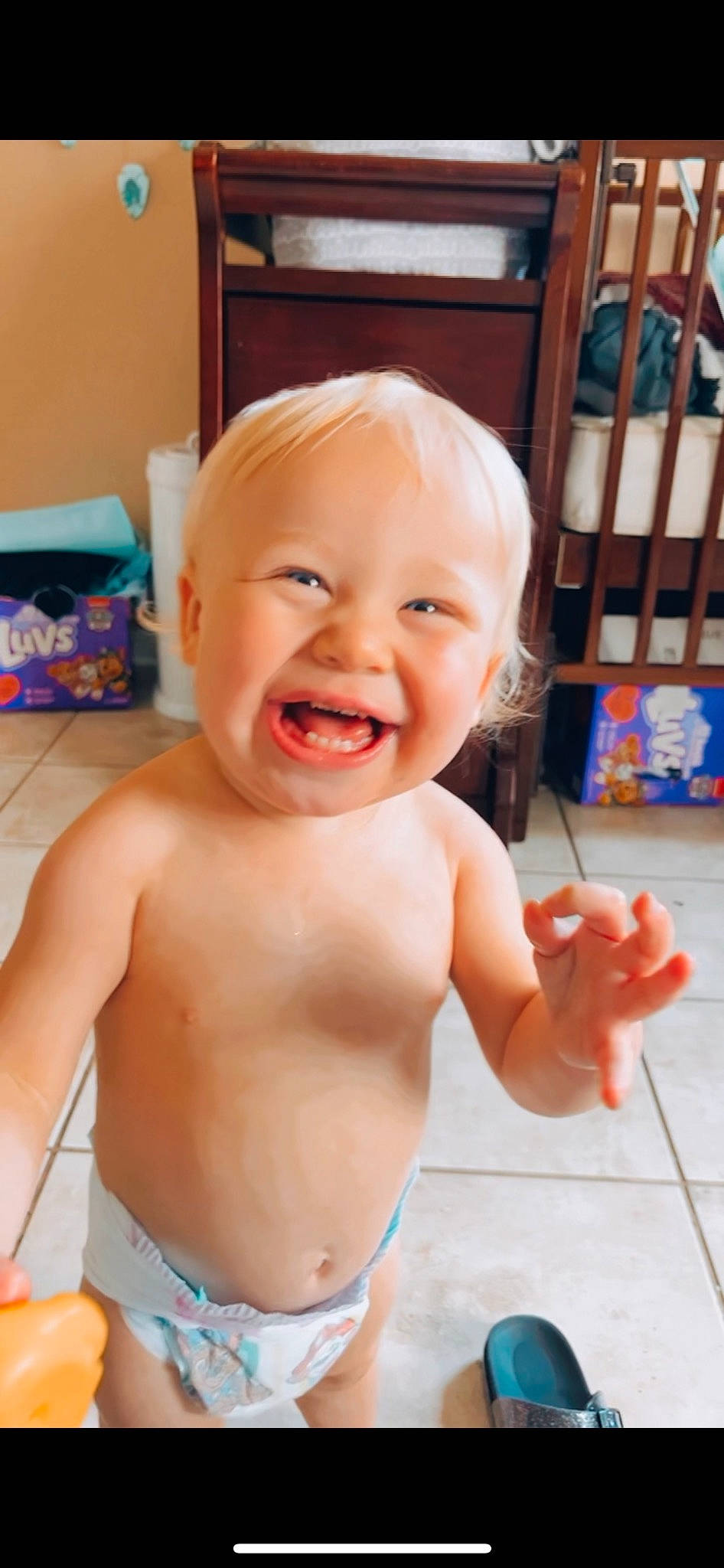 Sebastian Blaine is registered to the contest to win money with this photo: baby, baby_playing_with_toys, blue, bookcase, cheek, chest, child, eyebrow, finger, fun, gesture, happy, iris, mouth, nose, person, skin, smile, thumb, toddler
