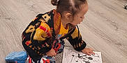 Braydon joined the competition — help win amazing prizes! toddler, child, coloring_book, mickey_mouse, toys, stacking_rings, toy_car, hedgehog_game, wooden_floor, kitchen_cabinets, diaper_boxes, pampers, indoor, kneeling, play, coloring, hair_buns, casual_clothing, home, childhood